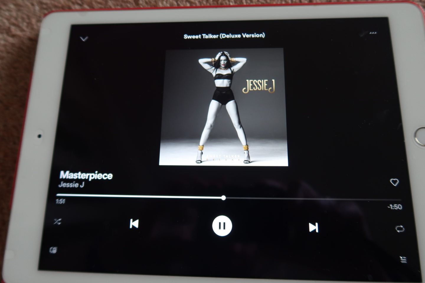 A photo of Masterpiece by Jessie J playing on an iPad